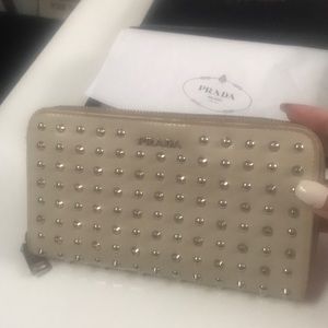 Prada authentic studded cream wallet
